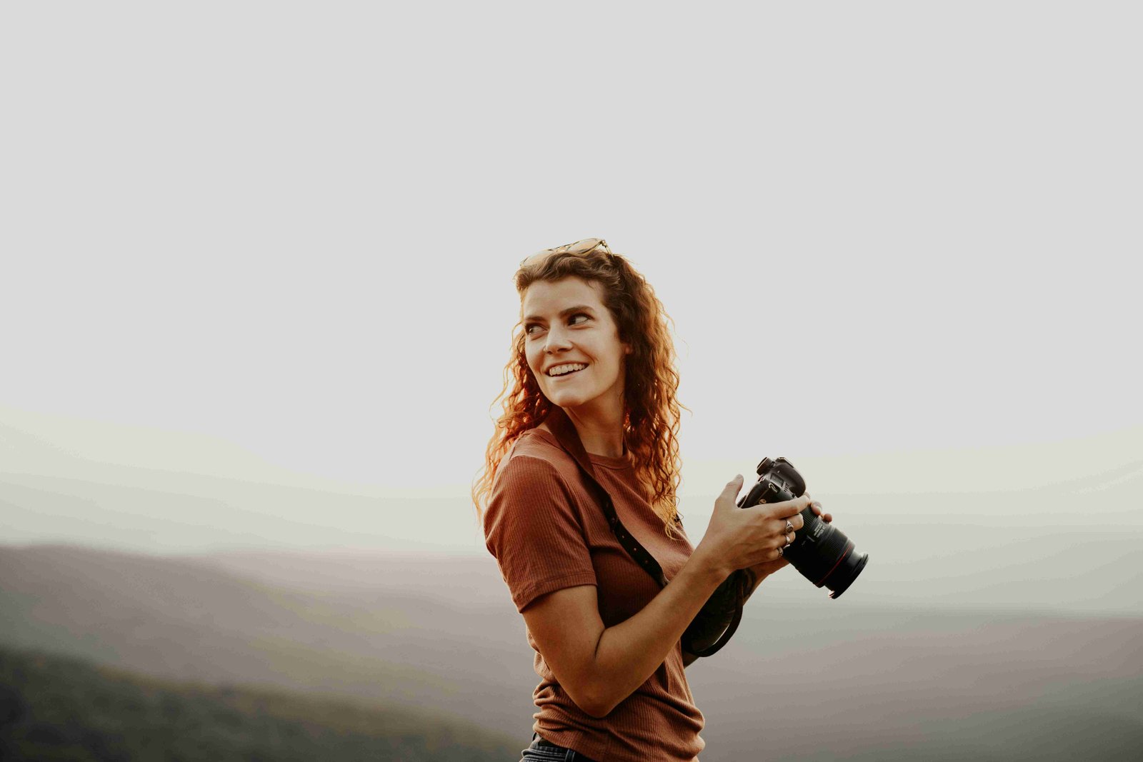 Photographer Charlotte McCoy with camera